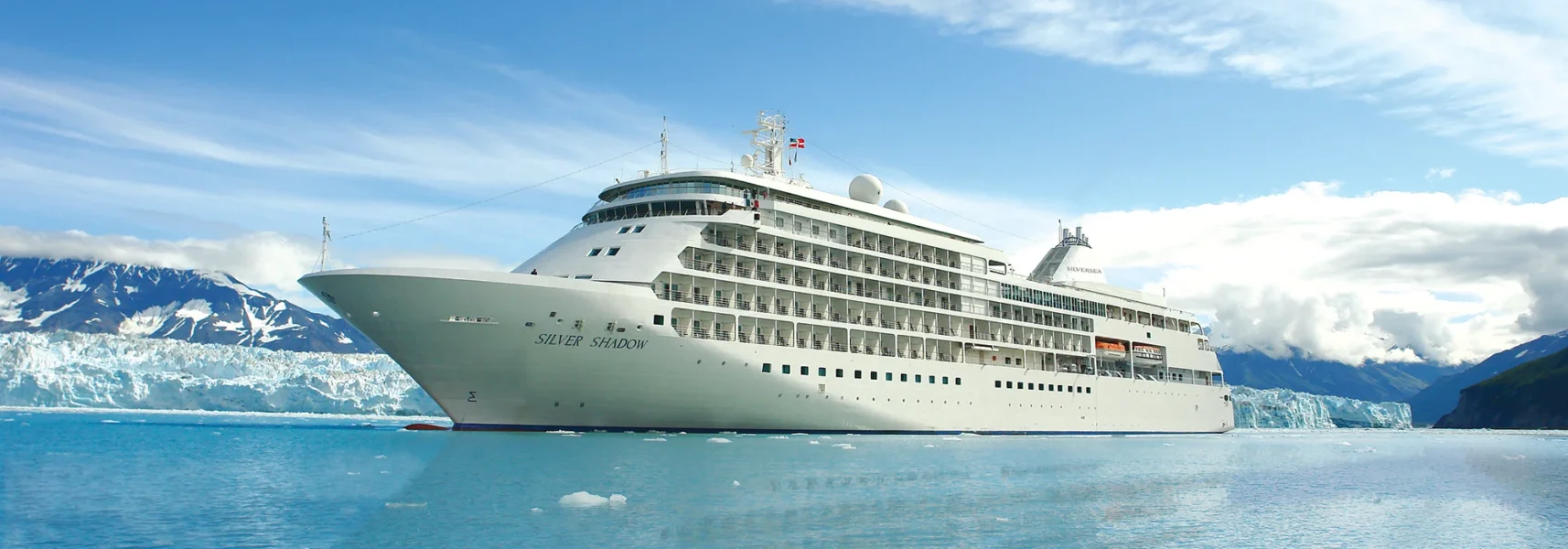 Image of luxury cruise ship in middle of sea